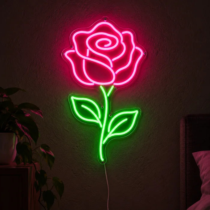 Rose Light Neon LED Sign glowing on a dark wall, close-up with connection cable