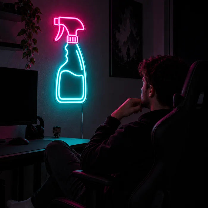 Clean Magic Neon LED Sign above a gaming desk, a gamer in a gaming chair in front of it
