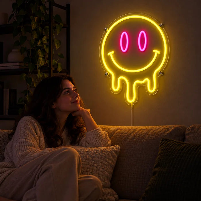 Melting Smiley Neon LED Sign on a living room wall, a person relaxing on the sofa in front of it