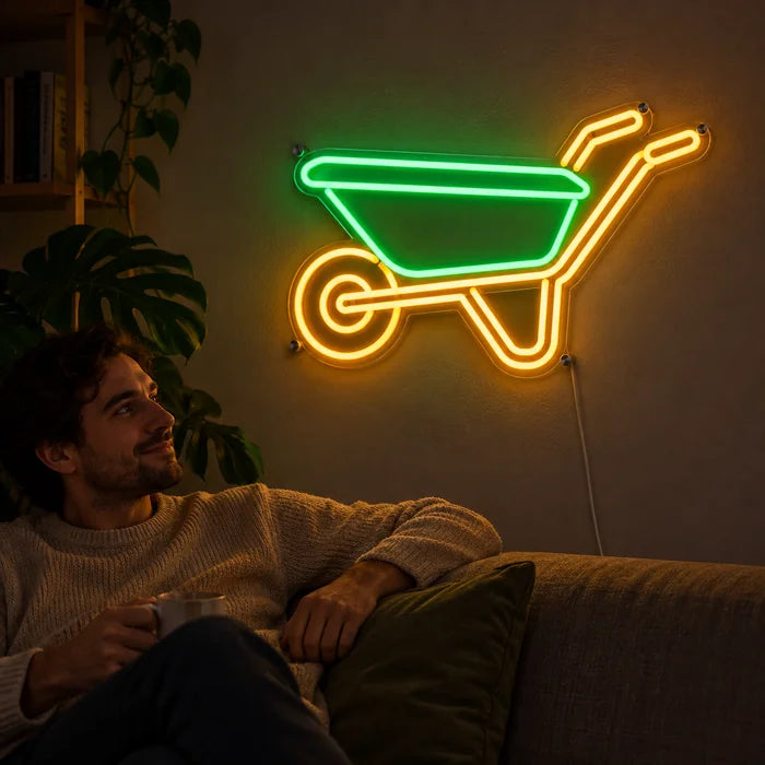 لافتة نيون LED عربة اليد، على جدار غرفة المعيشة، وأمامها شخص مسترخٍ على الأريكة