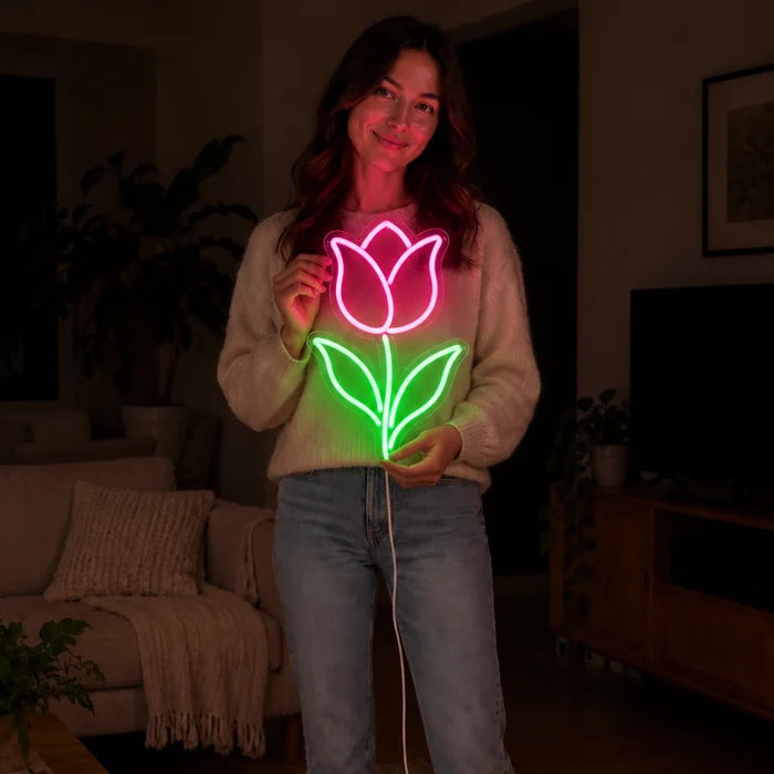 Tulip Neon LED Sign held by a woman, showing its size compared to her body