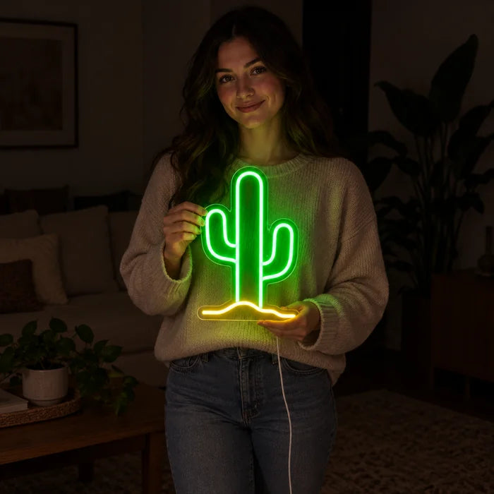 Desert Cactus Neon LED Sign held by a woman, showing its size compared to her body
